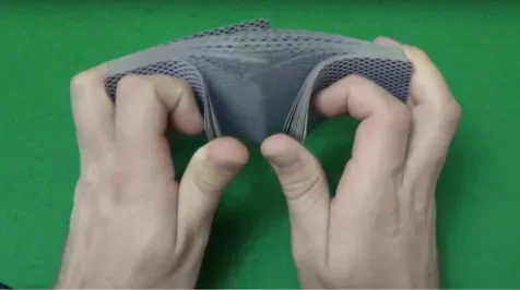 Figure 4.17 The entropy of a new deck of cards goes up after the dealer shuffles them. (credit: “Rommel SK”/YouTube)